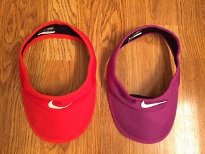 Two New Nike womens DriFit Feather Light tennis Visors, Red Orange , Purple