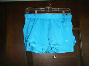 NIKE "LOVE TENNIS" Turquoise Shorts Size Medium Worn Once 88% Polyester 12% Span