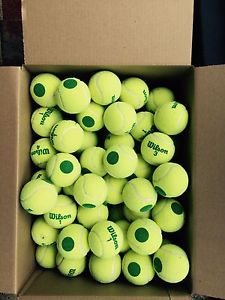 150 used green dot tennis balls