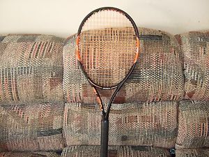 WILSON TENNIS RACKET. BURN 100 . A LITTLE USED. 4 1/4