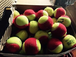 150 used red dot tennis balls