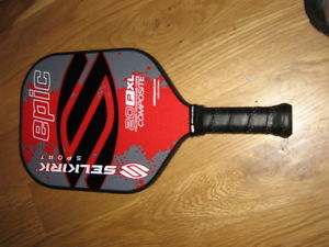 A brand new unused Selkirk Sport pickleball paddle Epic 20 P composite red-gray