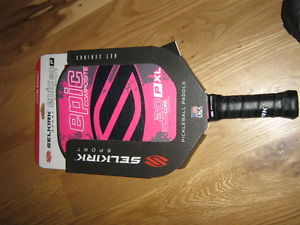 A brand new unused Selkirk Sport pickleball paddle Epic 20 P XL composite pink