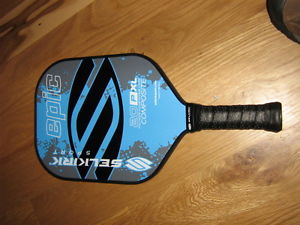 A brand new unused Selkirk Sport pickleball paddle Epic 20 P XL composite blue