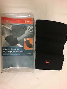 NIKE ELBOW SLEEVE COMPRESSIVE SUPPORT  TENNIS GOLF BASEBALL -PAIN RELIEF  L