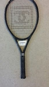 Channel tennis racket