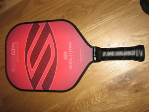 A brand new unused Selkirk Sport pickleball paddle 300 A XL graphite red