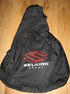 A brand new unused Selkirk Sport sling bag pickleball paddle ball carry