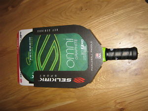 A brand new unused Selkirk Sport pickleball paddle Omni graphite green