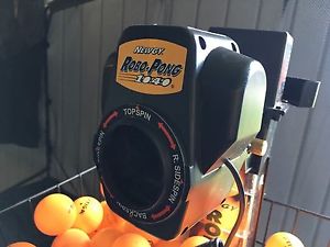 Newgy Robo Pong 1040 and Practice catch net ($60 value)