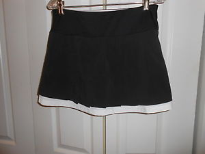 BOLLE--BLACK AND WHITE PLEATED TENNIS SKIRT WITH SHORTS (SKORT)--MEDIUM